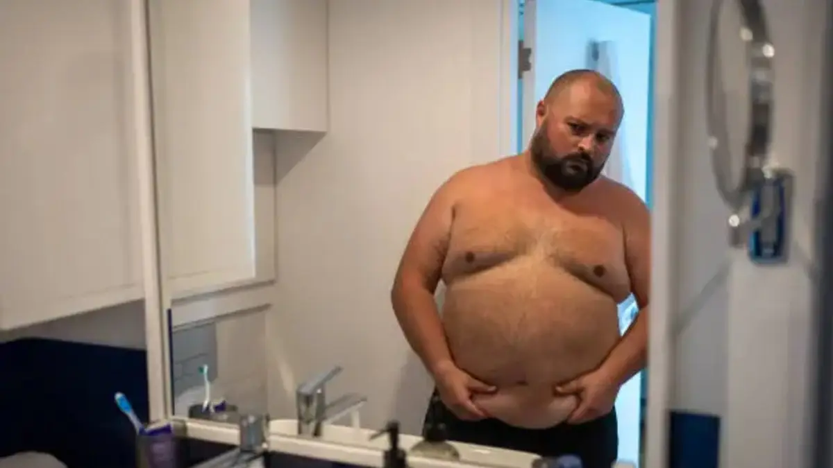Middle-aged man considering medical weight-loss treatment and GLP-1 medications