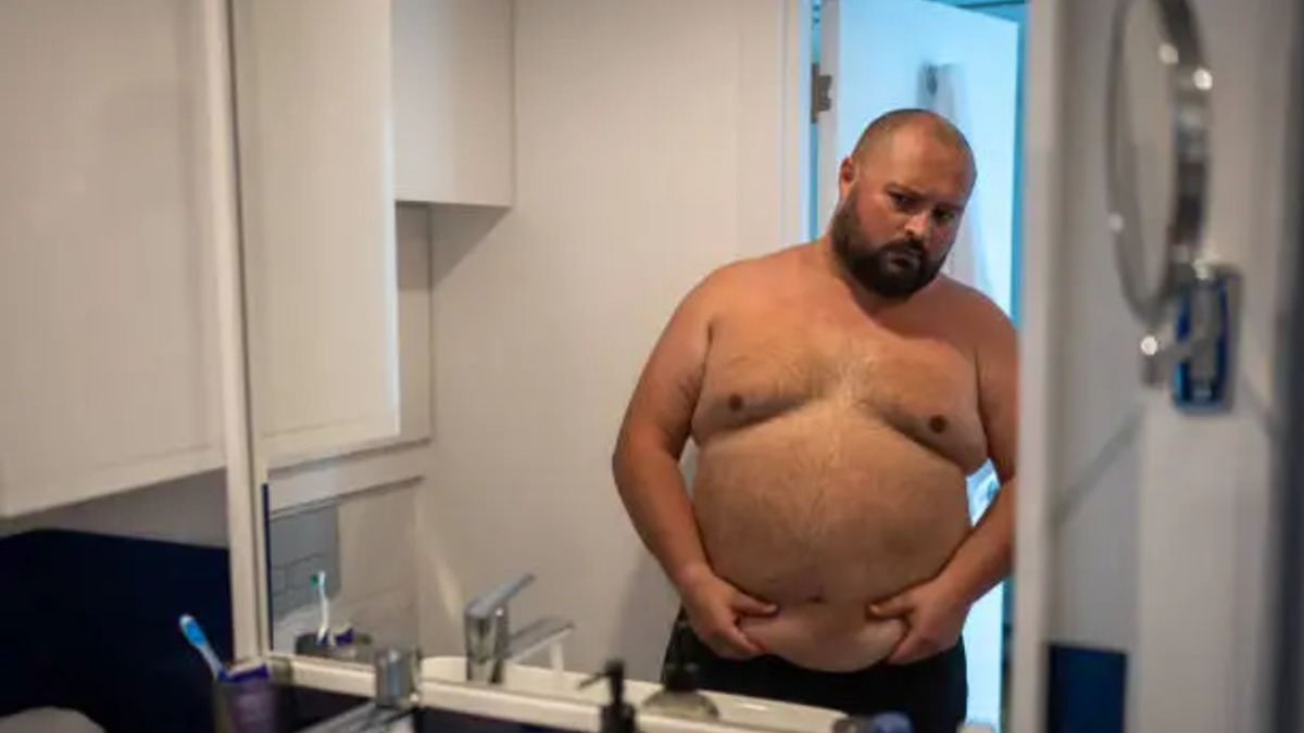 Middle-aged man considering medical weight-loss treatment and GLP-1 medications